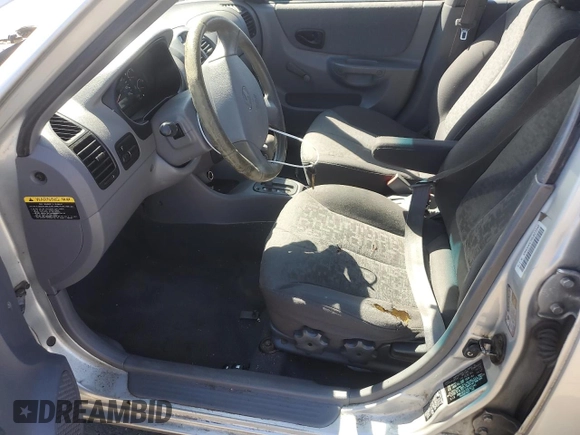 2005 Hyundai Accent GLS with VIN KMHCG45C55U623340, listed as a Copart auction lot 59587304 with 275,364 mi miles and Salvage Title. Bid and sale history available at carsss.com. Image 7.