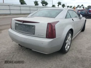2008 Cadillac XLR z VIN 1G6YV36A285600199, wystawiony jako Copart lot #76229514 z przebiegiem Nie podano mil oraz Szkody całkowita. Historia ofert i sprzedaży dostępna na DreamBid. Obrazek 3.