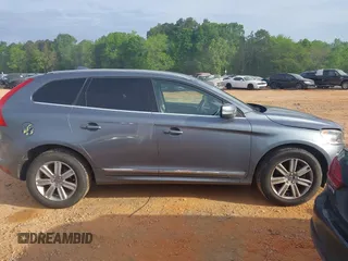 2017 Volvo XC60 Inscription z VIN YV440MDU1H2199868, wystawiony jako IAAI lot #42104412 z przebiegiem 169 841 mil mil oraz . Historia ofert i sprzedaży dostępna na DreamBid. Obrazek 13.