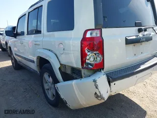 2007 Jeep Commander Sport with VIN 1J8HH48K07C587312, listed as a IAAI auction lot 42004278 with 208,390 mi miles. Bid and sale history available at carsss.com. Image 6.