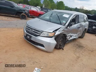 2013 Honda Odyssey LX with VIN 5FNRL5H27DB075559, listed as a IAAI auction lot 42007141 with Not Provided miles and . Bid and sale history available at carsss.com. Image 16.