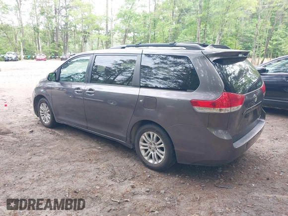 2011 Toyota Sienna XLE AAS with VIN 5TDYK3DC8BS016319, listed as a IAAI auction lot 42186294 with 293,401 mi miles and . Bid and sale history available at DreamBid. Image 3.