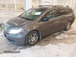 2012 Honda Odyssey EX-L with VIN 5FNRL5H66CB127507, listed as a IAAI auction lot 41961465 with 228,972 mi miles and . Bid and sale history available at carsss.com. Image 2.