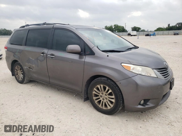 2014 Toyota Sienna XLE with VIN 5TDYK3DC2ES510647, listed as a Copart auction lot 54488845 with 216,091 mi miles and Salvage Title. Bid and sale history available at DreamBid. Image 4.