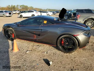 2017 McLaren 570S with VIN SBM13DAAXHW003255, listed as a Copart auction lot 84219454 with 0 mi miles and Salvage Title. Bid and sale history available at carsss.com. Image 2.