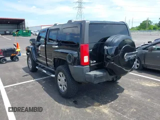 2006 Hummer H3 with VIN 5GTDN136268192985, listed as a IAAI auction lot 42211862 with 206,223 mi miles and . Bid and sale history available at DreamBid. Image 3.