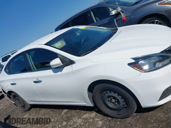 2018 Nissan Sentra S z VIN 3N1AB7AP7JY310031, wystawiony jako IAAI lot #41974445 z przebiegiem 106 842 mil mil oraz . Historia ofert i sprzedaży dostępna na DreamBid. Obrazek 13.