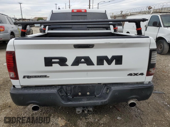 2018 Ram 1500 Rebel with VIN 1C6RR7YT7JS235965, listed as a Copart auction lot 84749674 with 61,484 mi miles and Salvage title. Bid and sale history available at DreamBid. Image 6.