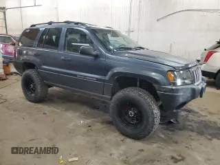 2004 Jeep Grand Cherokee Laredo with VIN 1J4GW48S24C294185, listed as a Copart auction lot 53357945 with 209,169 mi miles and Clean Title. Bid and sale history available at carsss.com. Image 4.