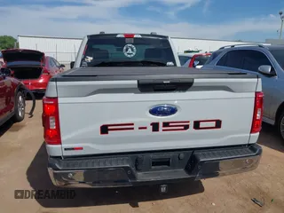 2023 Ford F-150 XL with VIN 1FTMF1C53PKF34184, listed as a IAAI auction lot 42242703 with 27,312 mi miles and . Bid and sale history available at DreamBid. Image 17.