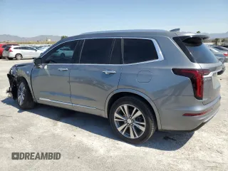 2021 Cadillac XT6 Premium Luxury with VIN 1GYKPCRS9MZ219271, listed as a Copart auction lot 51994715 with 44,616 mi miles and Salvage title. Bid and sale history available at DreamBid. Image 2.