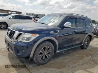 2017 Nissan Armada Platinum z VIN JN8AY2NEXH9707860, wystawiony jako Copart lot #58311335 z przebiegiem 58 884 mil mil oraz Szkoda całkowita • Salvage title. Historia ofert i sprzedaży dostępna na DreamBid. Obrazek 1.