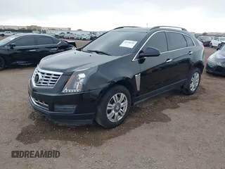 2015 Cadillac SRX with VIN 3GYFNAE37FS598023, listed as a IAAI auction lot 41198546 with 127,373 mi miles and . Bid and sale history available at carsss.com. Image 2.