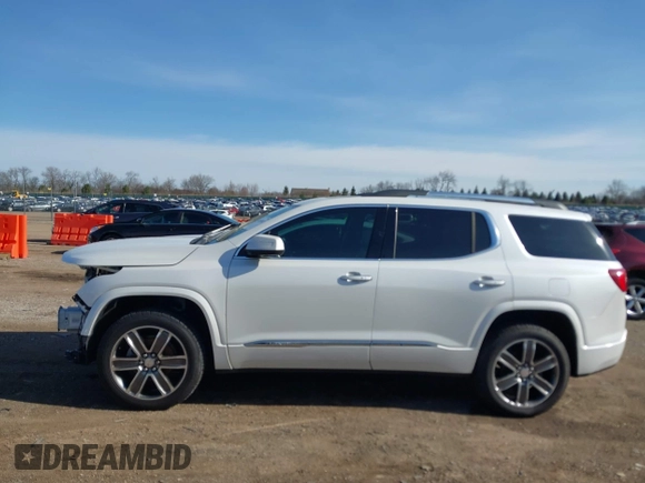 2019 GMC Acadia Denali with VIN 1GKKNXLSXKZ173883, listed as a IAAI auction lot 41863843 with 85,067 mi miles and . Bid and sale history available at carsss.com. Image 14.