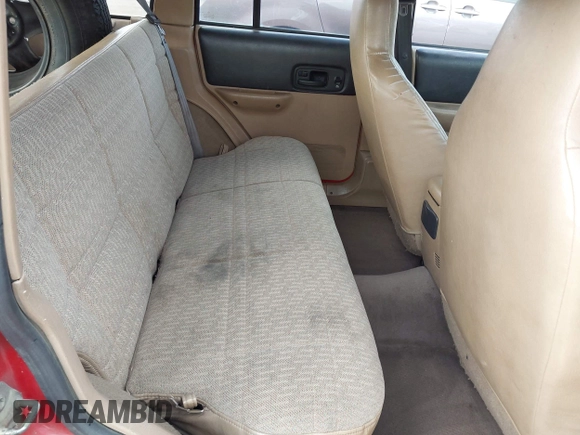 1999 Jeep Cherokee Sport with VIN 1J4FF68S8XL533881, listed as a IAAI auction lot 41947085 with 200,970 mi miles and . Bid and sale history available at DreamBid. Image 8.