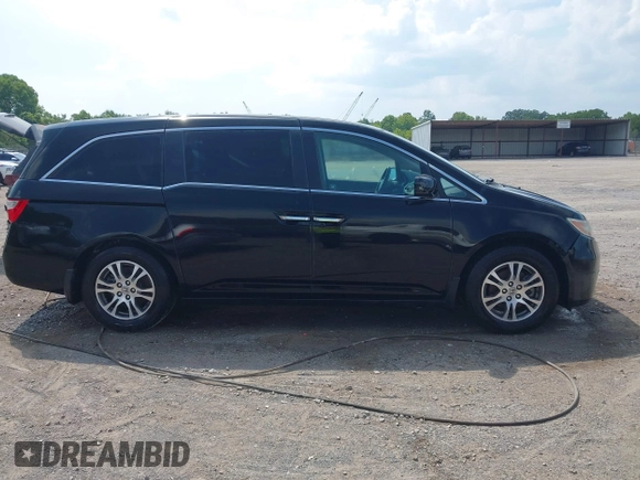 2011 Honda Odyssey EX-L with VIN 5FNRL5H69BB037248, listed as a IAAI auction lot 42613070 with 101,008 mi miles and . Bid and sale history available at DreamBid. Image 13.