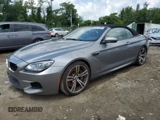 2014 BMW M6 with VIN WBSLZ9C59EDZ78374, listed as a Copart auction lot 64514265 with 116,864 mi miles and Salvage title. Bid and sale history available at DreamBid. Image 1.