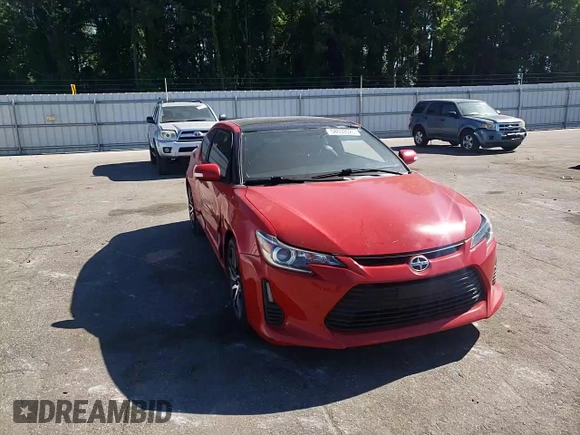 2015 Scion tC z VIN JTKJF5C78F3091348, wystawiony jako Copart lot #54659525 z przebiegiem 229 840 mil mil oraz Szkoda całkowita • Salvage title. Historia ofert i sprzedaży dostępna na DreamBid. Obrazek 13.