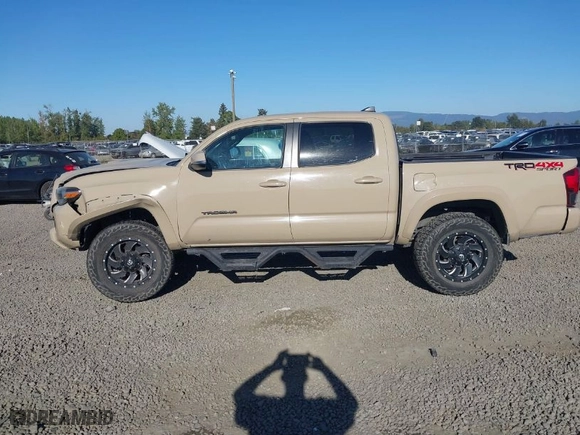 2018 Toyota Tacoma SR with VIN 3TMCZ5AN7JM125425, listed as a IAAI auction lot 40459066 with NaN miles. Bid and sale history available at carsss.com. Image 14.