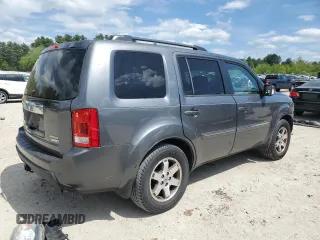 2011 Honda Pilot Touring z VIN 5FNYF4H91BB104027, wystawiony jako Copart lot #56286595 z przebiegiem 180 622 mil mil oraz Czysty tytuł • Clean title. Historia ofert i sprzedaży dostępna na DreamBid. Obrazek 3.