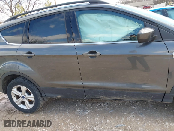 2016 Ford Escape SE z VIN 1FMCU9G92GUC37694, wystawiony jako IAAI lot #41917697 z przebiegiem 78 511 mil mil oraz . Historia ofert i sprzedaży dostępna na DreamBid. Obrazek 13.