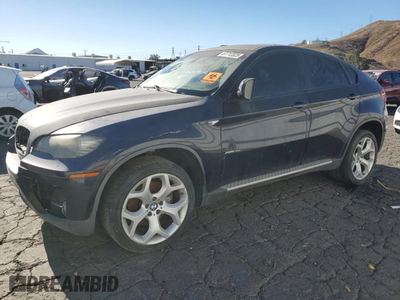 2009 BMW X6 z VIN 5UXFG43539L224989, wystawiony jako Copart lot #87712525 z przebiegiem 124 696 mil mil oraz Czysty tytuł • Clean title. Historia ofert i sprzedaży dostępna na DreamBid. Obrazek 1.