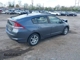 2013 Honda Insight EX z VIN JHMZE2H71DS004170, wystawiony jako IAAI lot #41971733 z przebiegiem 174 000 mil mil oraz . Historia ofert i sprzedaży dostępna na DreamBid. Obrazek 4.