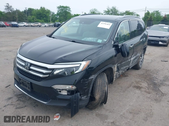 2017 Honda Pilot Touring with VIN 5FNYF6H90HB052474, listed as a IAAI auction lot 42291464 with 103,288 mi miles and . Bid and sale history available at DreamBid. Image 17.
