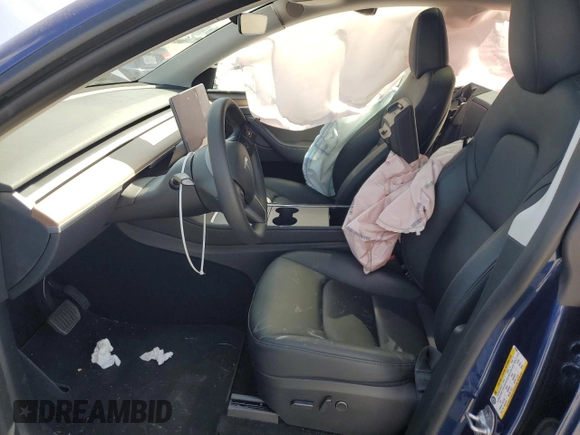 2023 Tesla Model Y Long Range with VIN 7SAYGAEE8PF927092, listed as a Copart auction lot 53917185 with 17,639 mi miles and Salvage Title. Bid and sale history available at DreamBid. Image 7.