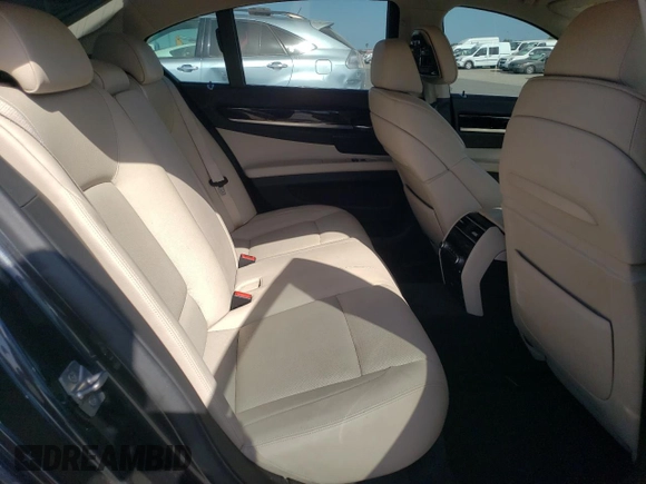 2012 BMW 7 Series 740i with VIN WBAKA4C54CC613419, listed as a Copart auction lot 54420885 with 104,006 mi miles and Salvage Title. Bid and sale history available at DreamBid. Image 10.