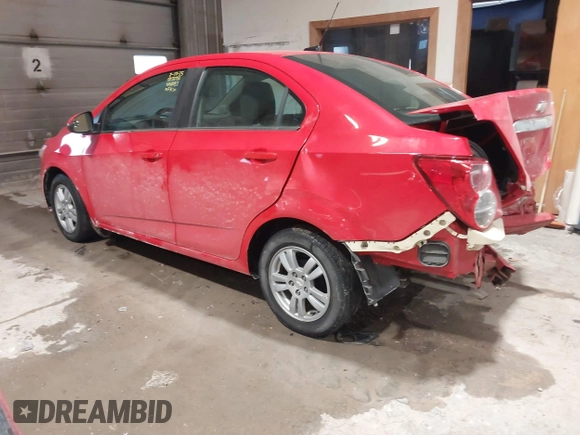 2014 Chevrolet Sonic LT with VIN 1G1JC5SH2E4214489, listed as a IAAI auction lot 41650289 with 93,388 mi miles and . Bid and sale history available at DreamBid. Image 3.