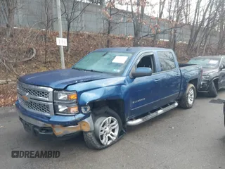 2015 Chevrolet Silverado 1500 LT with VIN 3GCUKREC5FG468054, listed as a IAAI auction lot 41459655 with 157,236 mi miles. Bid and sale history available at carsss.com. Image 2.