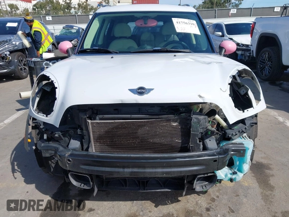 2014 MINI Countryman S with VIN WMWZC3C52EWP26869, listed as a IAAI auction lot 41756310 with 91,941 mi miles and . Bid and sale history available at DreamBid. Image 6.
