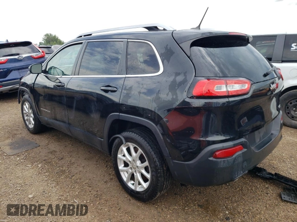 2014 Jeep Cherokee Latitude with VIN 1C4PJLCSXEW320764, listed as a Copart auction lot 83899244 with 140,904 mi miles and Salvage Title. Bid and sale history available at carsss.com. Image 2.