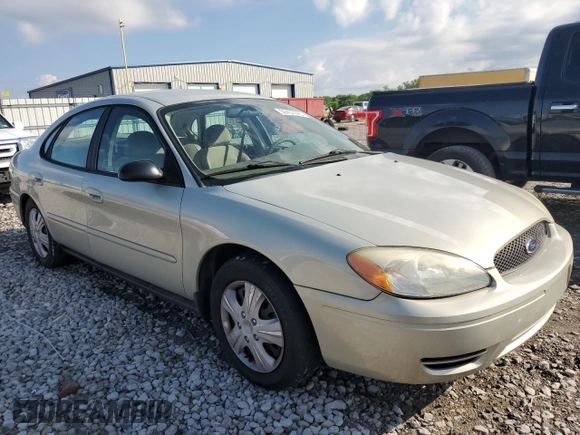 2005 Ford Taurus SE with VIN 1FAFP53U95A101336, listed as a Copart auction lot 56457095 with 127,656 mi miles and Salvage title. Bid and sale history available at DreamBid. Image 4.