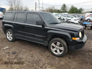 2013 Jeep Patriot Latitude with VIN 1C4NJPFB1DD255761, listed as a Copart auction lot 52772015 with 184,635 mi miles and Salvage Title. Bid and sale history available at carsss.com. Image 4.