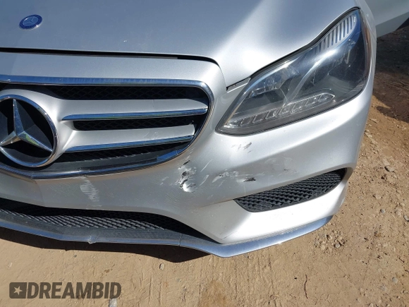 2014 Mercedes-Benz E-Class E 250 BlueTEC Luxury with VIN WDDHF0EB6EA967831, listed as a IAAI auction lot 41660612 with 187,041 mi miles. Bid and sale history available at carsss.com. Image 6.