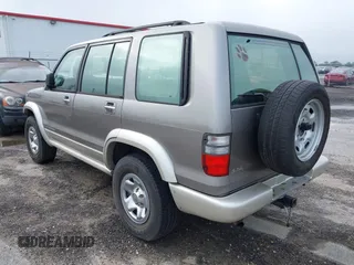 2002 Isuzu Trooper S with VIN JACDJ58X527J07745, listed as a IAAI auction lot 42714673 with 122,482 mi miles and . Bid and sale history available at DreamBid. Image 3.