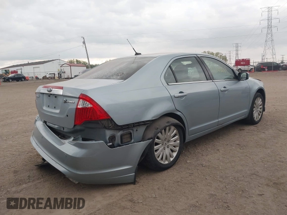 2010 Ford Fusion Hybrid z VIN 3FADP0L36AR200035, wystawiony jako IAAI lot #42145684 z przebiegiem 142 137 mil mil oraz . Historia ofert i sprzedaży dostępna na DreamBid. Obrazek 6.