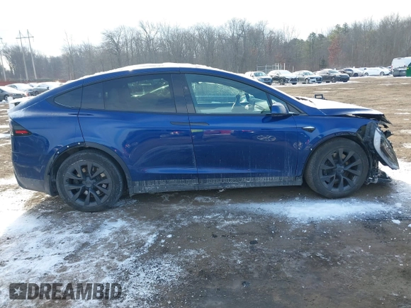 2022 Tesla Model X Plaid z VIN 7SAXCBE69NF343318, wystawiony jako IAAI lot #41387403 z przebiegiem Nie podano mil oraz . Historia ofert i sprzedaży dostępna na DreamBid. Obrazek 13.
