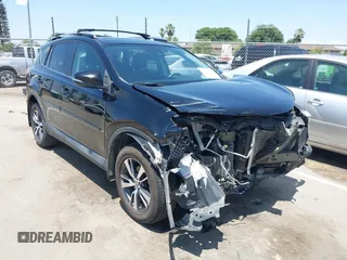 2018 Toyota RAV4 XLE with VIN 2T3WFREV2JW447623, listed as a IAAI auction lot 42410168 with 84,800 mi miles and . Bid and sale history available at DreamBid. Image 1.