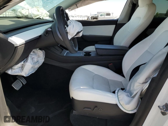 2022 Tesla Model Y Performance with VIN 7SAYGDEF9NF392197, listed as a Copart auction lot 57259105 with 43,400 mi miles and Salvage title. Bid and sale history available at DreamBid. Image 7.