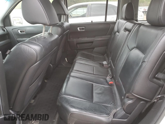 2013 Honda Pilot Touring with VIN 5FNYF3H99DB007204, listed as a Copart auction lot 56891095 with 151,709 mi miles and Salvage title. Bid and sale history available at DreamBid. Image 11.