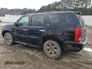 2009 GMC Yukon SLT w/4SB with VIN 1GKFK33099R228562, listed as a Copart auction lot 42191375 with 133,568 mi miles and Salvage Title. Bid and sale history available at carsss.com. Image 2.