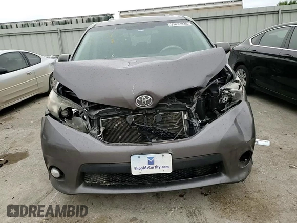 2014 Toyota Sienna SE с VIN 5TDXK3DC1ES519741, выставлен на аукционе Copart как лот 53892035 с пробегом Не указан миль и Списание • Salvage title. История ставок и продаж доступна на DreamBid. Изображение 14.