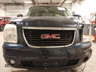 2007 GMC Yukon SLT z VIN 1GKFK130X7J115798, wystawiony jako IAAI lot #42039550 z przebiegiem 263 539 mil mil oraz . Historia ofert i sprzedaży dostępna na DreamBid. Obrazek 13.
