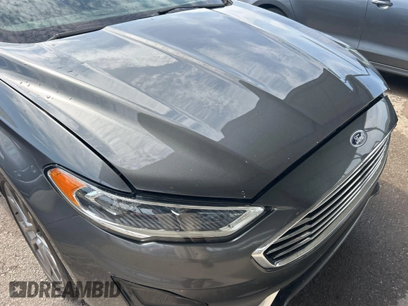 2020 Ford Fusion SEL with VIN 3FA6P0CD7LR197568, listed as a IAAI auction lot 42725343 with 111,304 mi miles and . Bid and sale history available at DreamBid. Image 10.