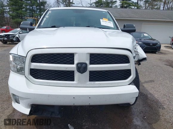 2015 Ram 1500 Express z VIN 1C6RR7KT3FS647476, wystawiony jako IAAI lot #41987391 z przebiegiem 150 000 mil mil oraz . Historia ofert i sprzedaży dostępna na DreamBid. Obrazek 13.