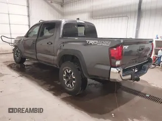 2019 Toyota Tacoma SR with VIN 5TFCZ5AN7KX208672, listed as a IAAI auction lot 42143071 with 83,584 mi miles and . Bid and sale history available at DreamBid. Image 3.