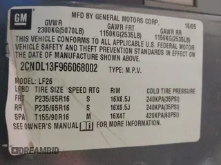 2006 Chevrolet Equinox LS with VIN 2CNDL13F966068002, listed as a IAAI auction lot 41969812 with 154,463 mi miles. Bid and sale history available at carsss.com. Image 9.